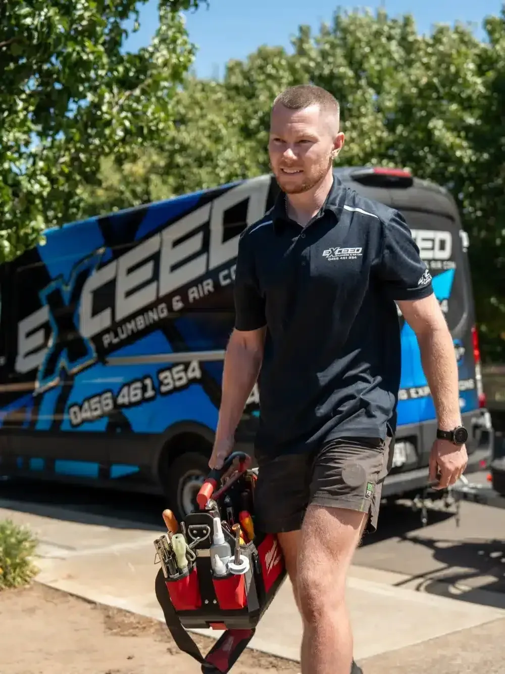Local plumber arriving at a Woodcroft home