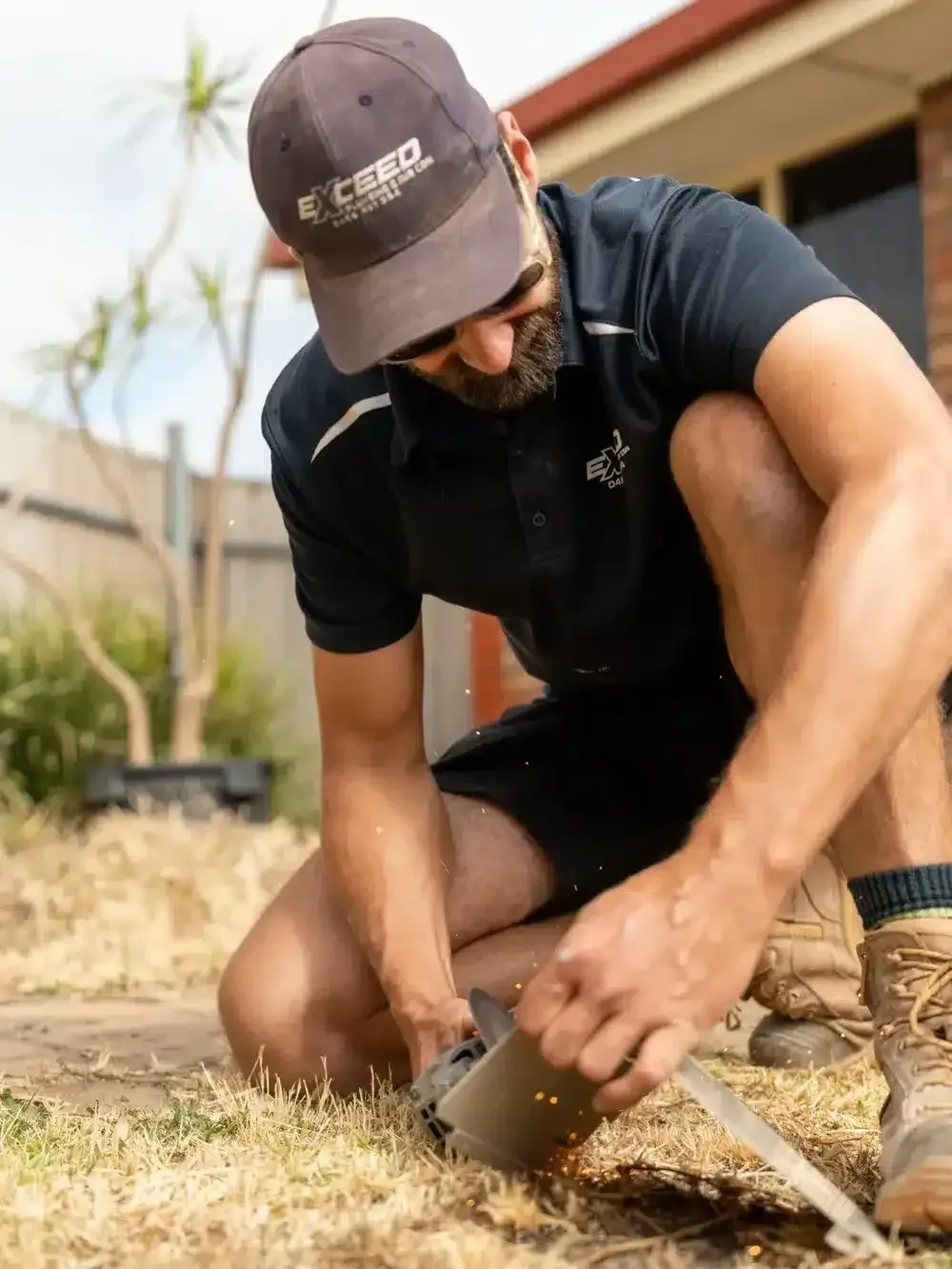 A Woodcroft plumber at work on a job